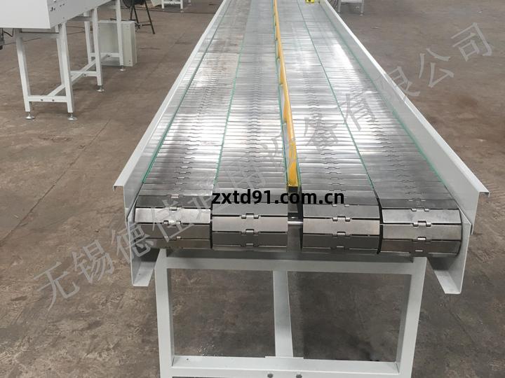 不(bu)銹鋼鏈(lian)板輸送(song)機